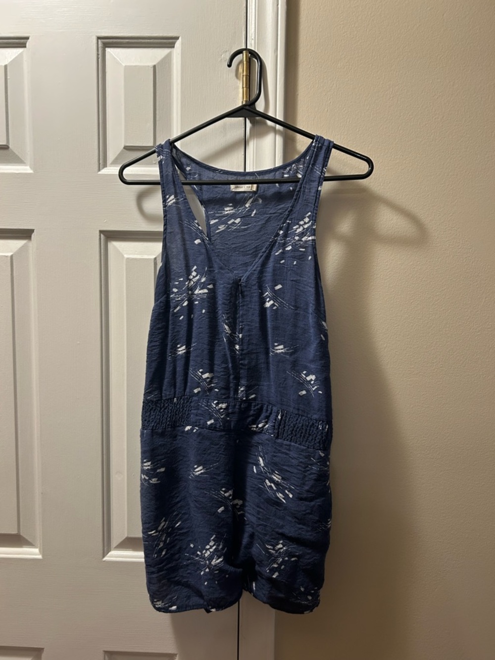 silence + noise blue onesie with white pattern